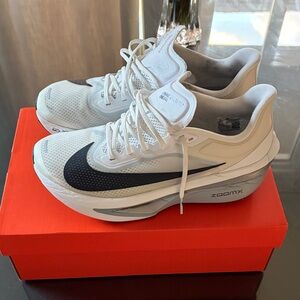 Nike Men’s White Sneakers with Black Swoosh